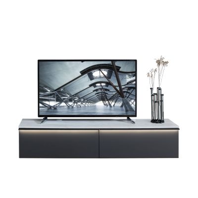 Schwebendes TV-Lowboard in Anthrazit mit Abdeckplatte in Marmoroptik und integrierter LED-Beleuchtung.