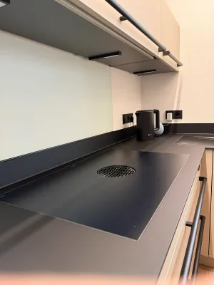 Detailansicht Bora Kochfeld in moderner Schüller Küche