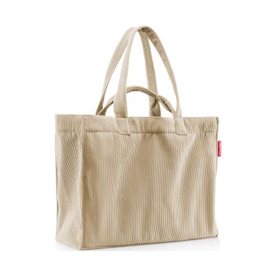 Beige Reisenthel Shopper Tasche aus weichem Cordstoff mit langen und kurzen Tragegriffen auf hellem Hintergrund