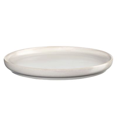 Brotteller der Serie Coppa, Farbe Nude, freigestellt auf hellem Hintergrund.