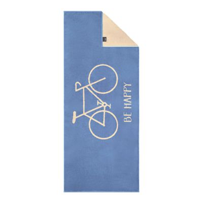 Blaues Strandtuch Travel in Capri mit hellem Fahrradmotiv und „BE HAPPY“-Schriftzug, oben mit umgelegter Ecke.