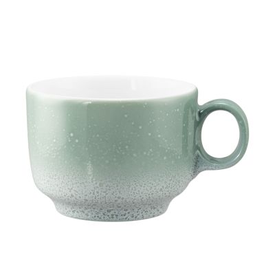 Tasse in Mint; niedrige Form mit gesprenkeltem Farbverlauf und Henkel. Ansicht: Seitenansicht.