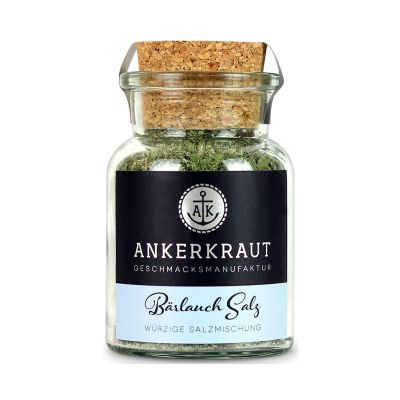 Bärlauch Salz im Ankerkraut-Glas mit Korken; durch das Glas ist eine grünlich gesprenkelte Salzmischung zu erkennen.