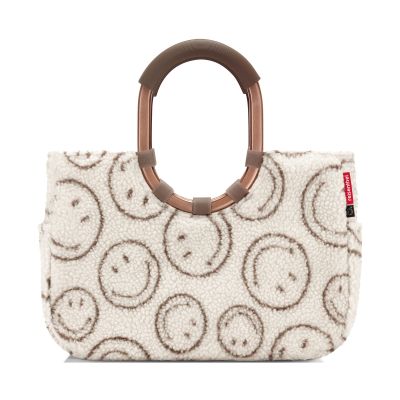 Shopper mit Ringgriffen von Reisenthel, Modell Loopshopper M, in Creme und Braun mit Smiley-Muster aus Teddyfleece, von hinten mit ovalen Ringgriffen