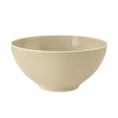 Schale in Sandbeige; Seitenansicht. Sichtbare Gestaltung: rund, tief und innen geriffelt.