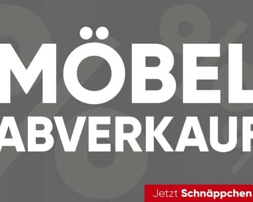 Fetter Text mit der Aufschrift „Möbel Abverkauf“ auf dunklem Hintergrund, mit „Jetzt Schnäppchen bei Möbel Gruber sichern!“ unten in Rot.