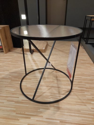 Bild von einem runden schwarzen Tisch aus Glas